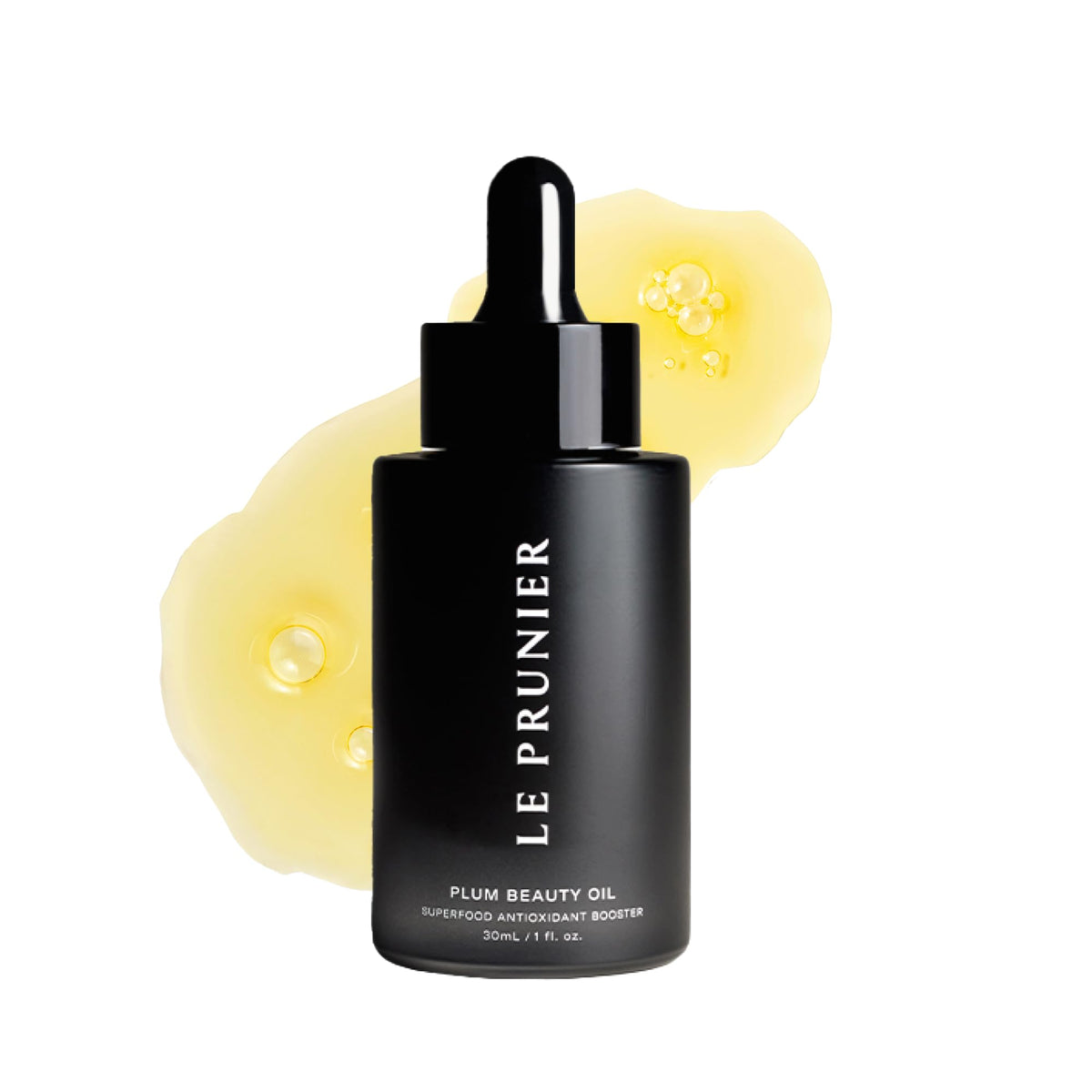 Le Prunier Plum Beauty Oil bottle with dropper delivering lightweight hydration for radiant skin.