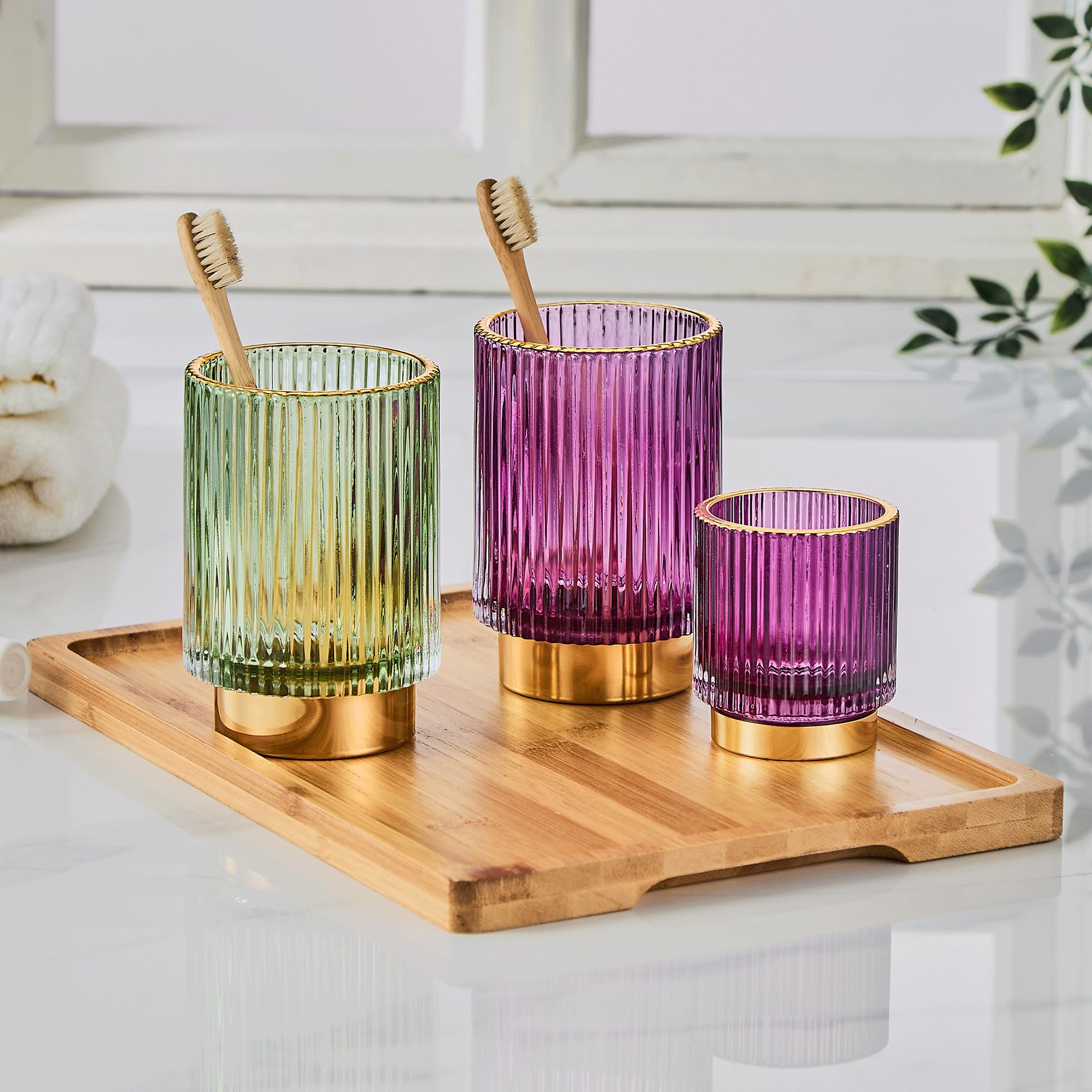 LEICURACE glass bottle with gold edge enhances display on any counter.