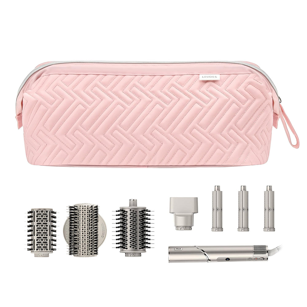 Lightweight pink travel bag ideal for hanging and portability.