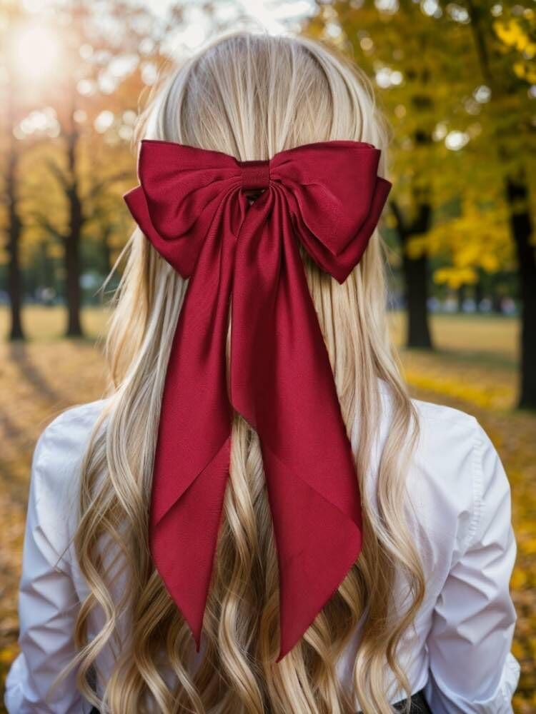 LFOUVRE burgundy satin bow with non-slip clip for secure placement