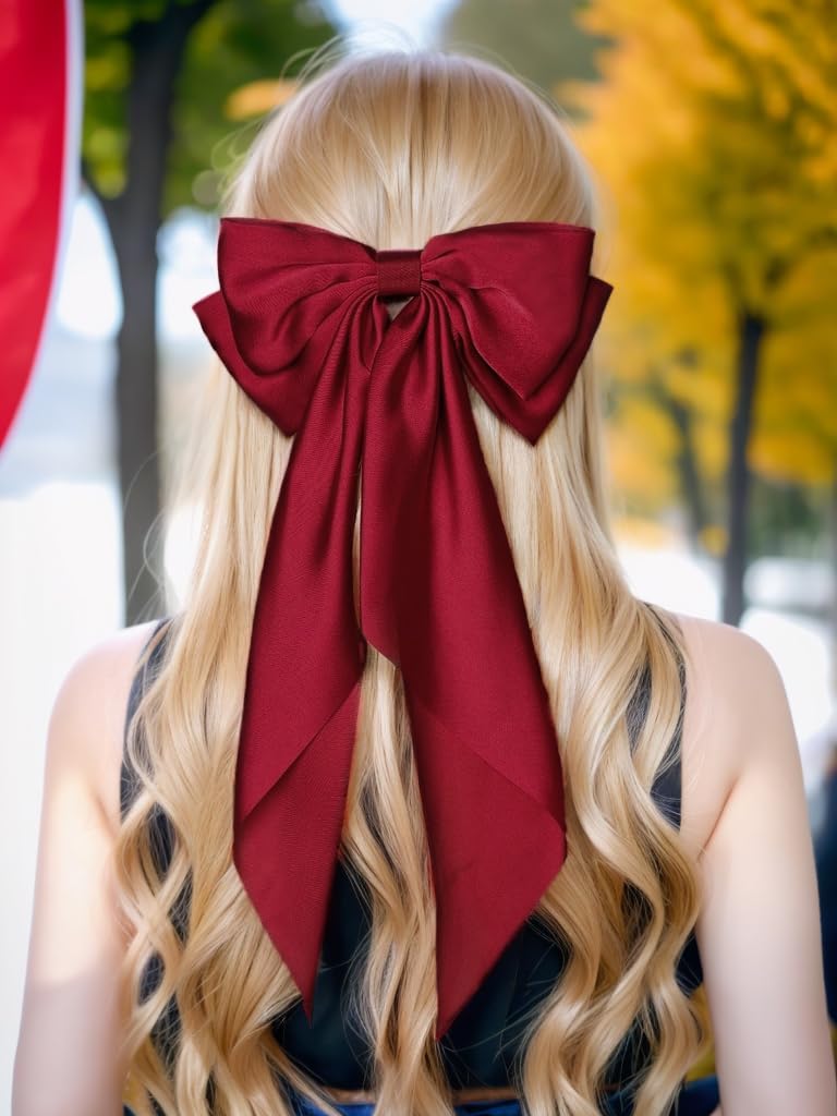 LFOUVRE burgundy satin bow worn on the side for everyday looks