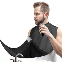 Likeny Beard Bib Apron setup on mirror shows mess-free grooming in action.