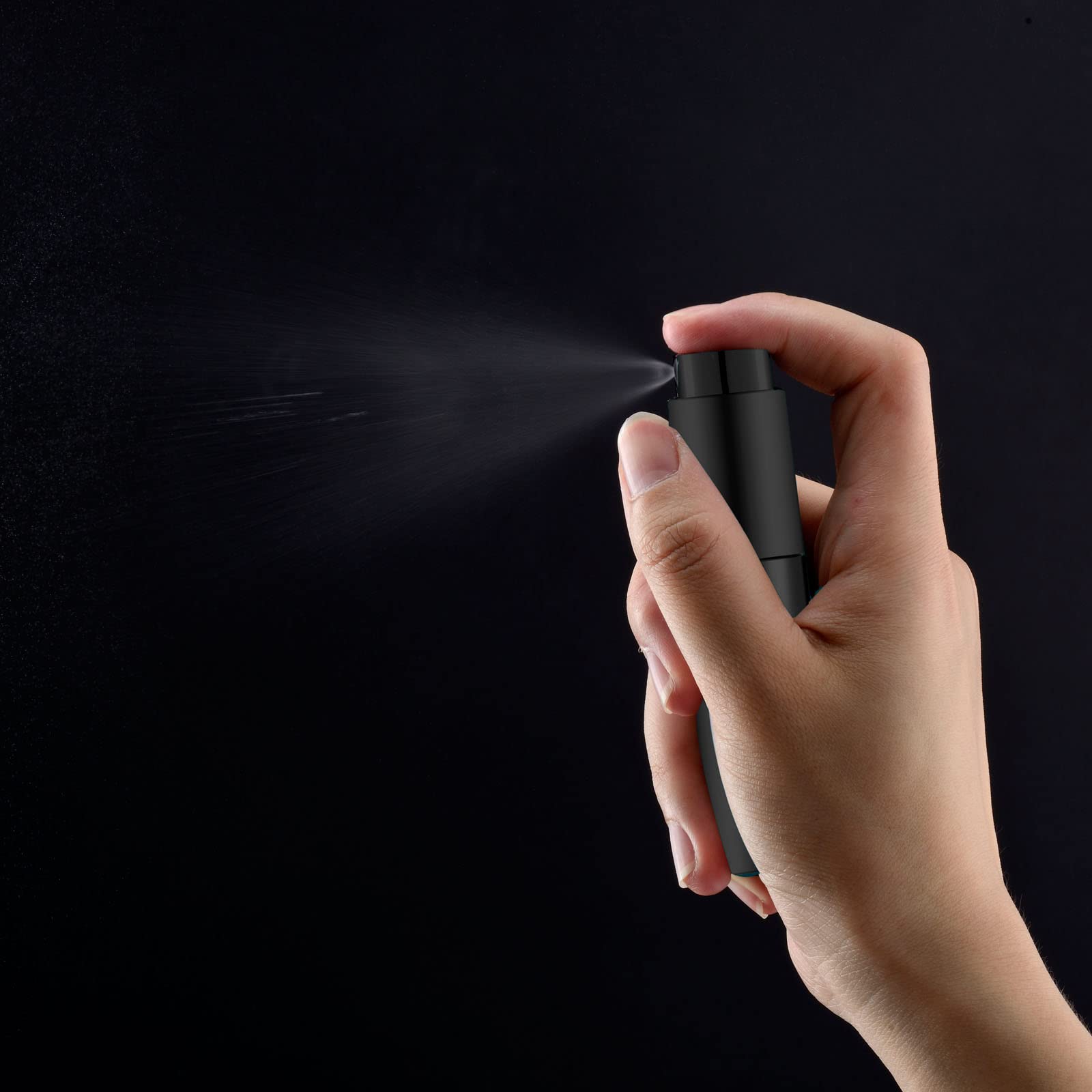 Lil Ray matte black twist-lid atomizer shows simple one-handed operation