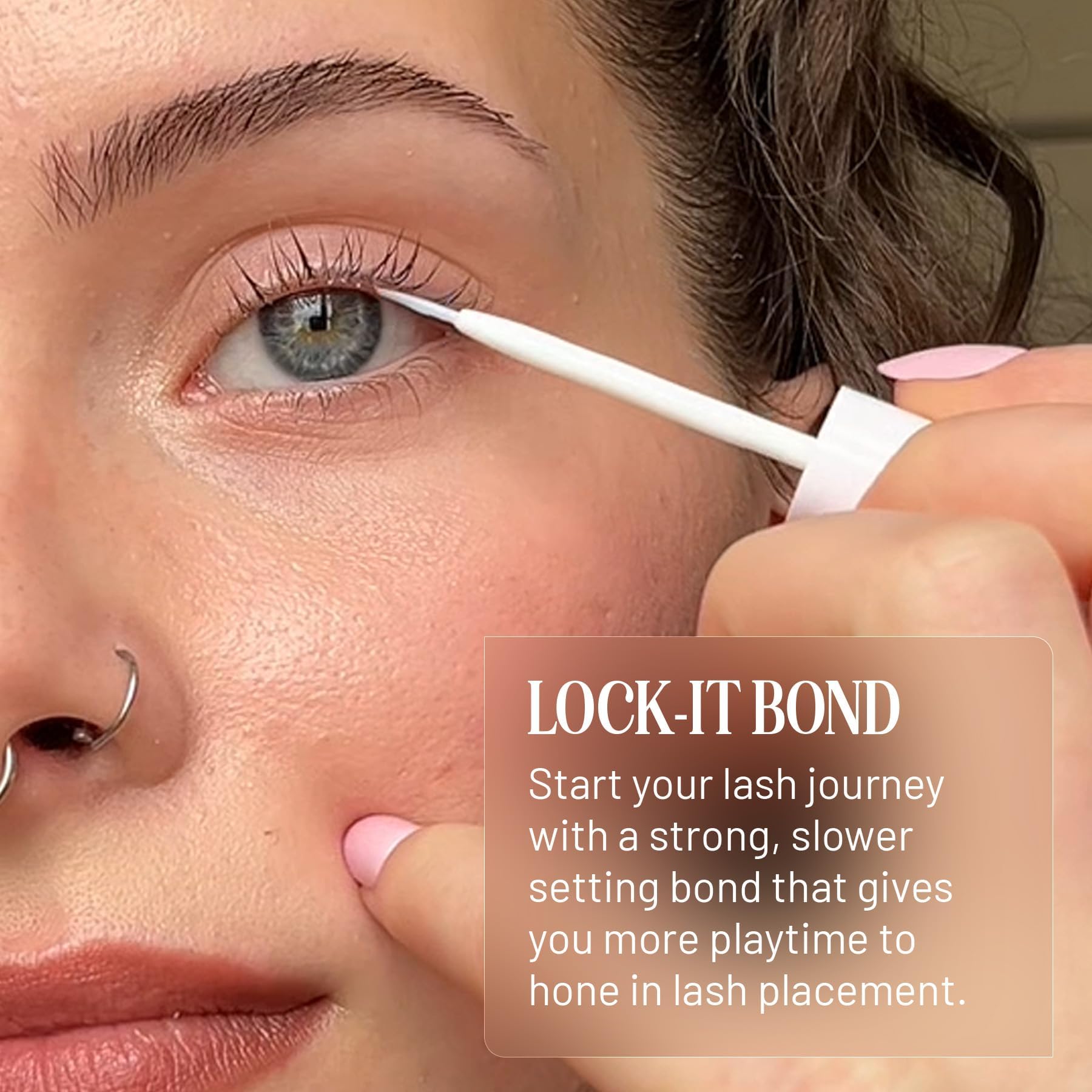 Lilac St Lock-It-Bond Black brush-tip applicator for precise lash placement.