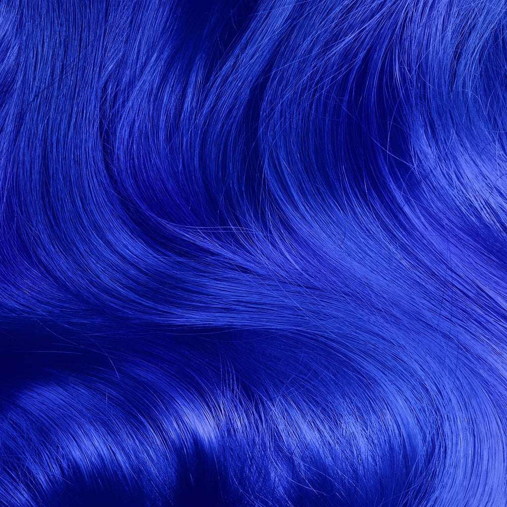 Lime Crime Unicorn Hair Dye application close-up with foam texture and even distribution