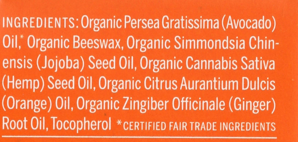 Applying Dr. Bronner's lip balm on lips for smooth, conditioned lips.