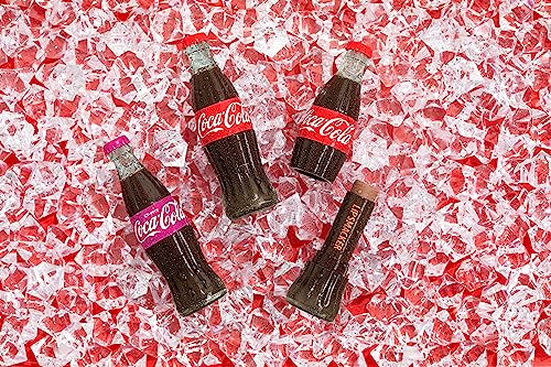 Lip Smacker Coca-Cola bottle gloss captures subtle shine for a healthy-looking pout.