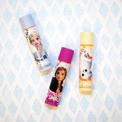 Lip Smacker Disney Frozen 2 Optimistic Berry balm delivers soft shine.