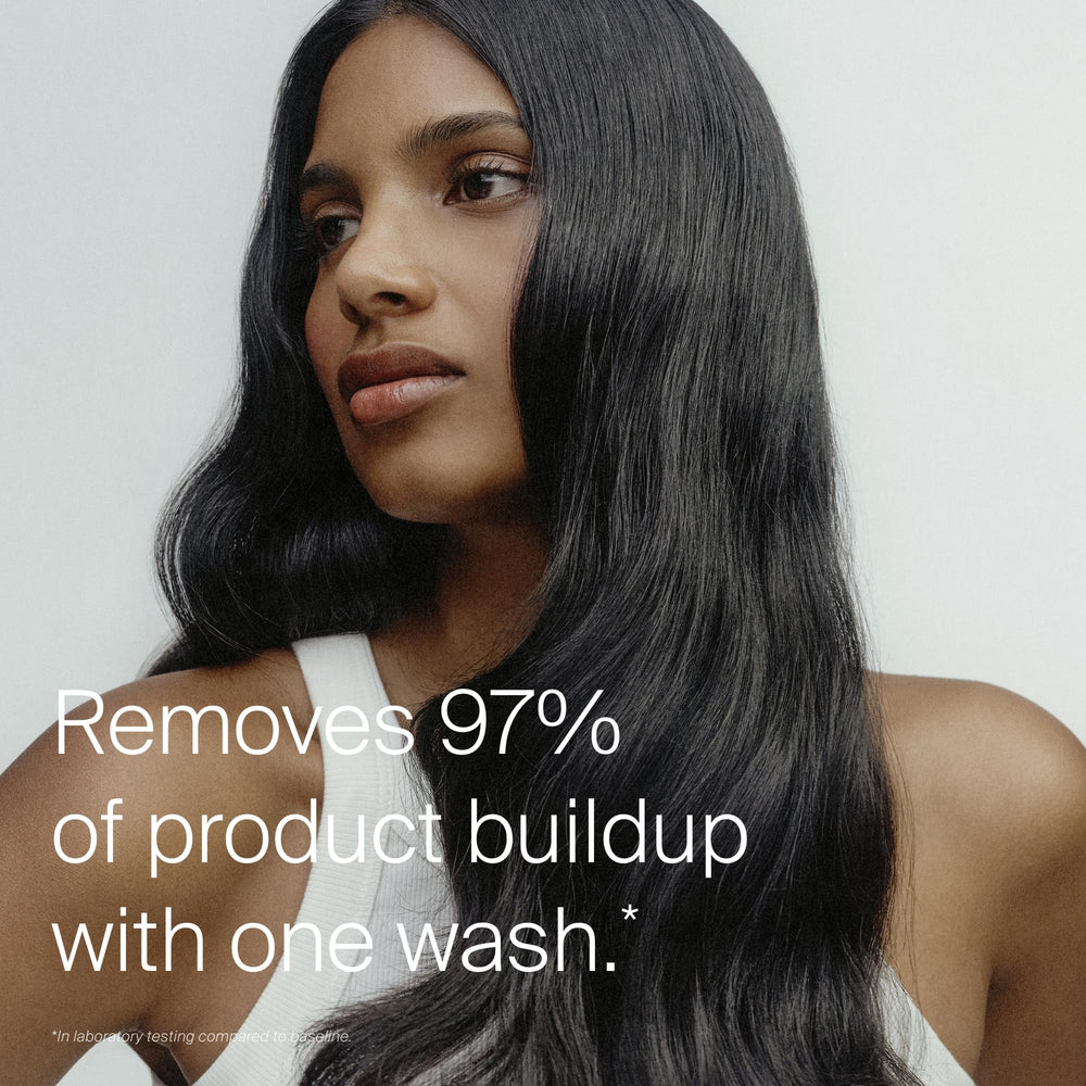 Living Proof Clarifying Detox Shampoo bottle pump application demonstrates deep cleanse.