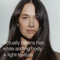 Living Proof Dry Shampoo bottle top demonstrates easy spray refresh.
