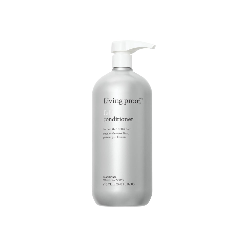 Living Proof Full Conditioner bottle closeup showing silicone-free formula for color-treated hair.