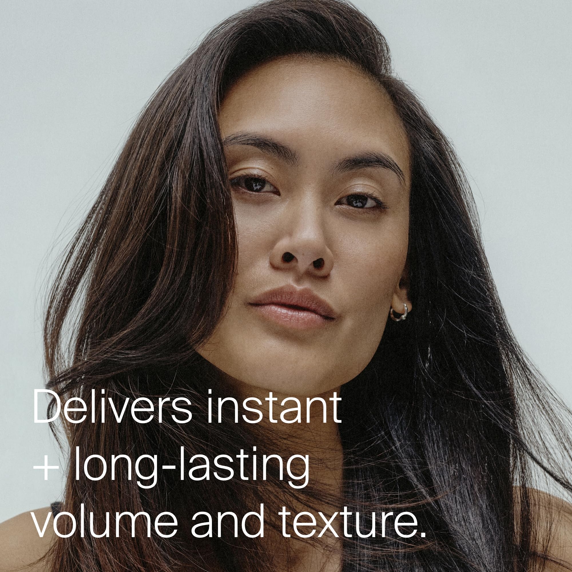 Living Proof Full Dry Volume Spray in hand enables quick refresh and texture