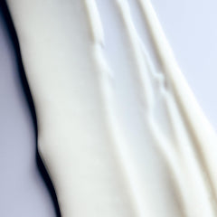 Living Proof Moisture Rescue Mask texture closeup highlights creamy, hydrating formula