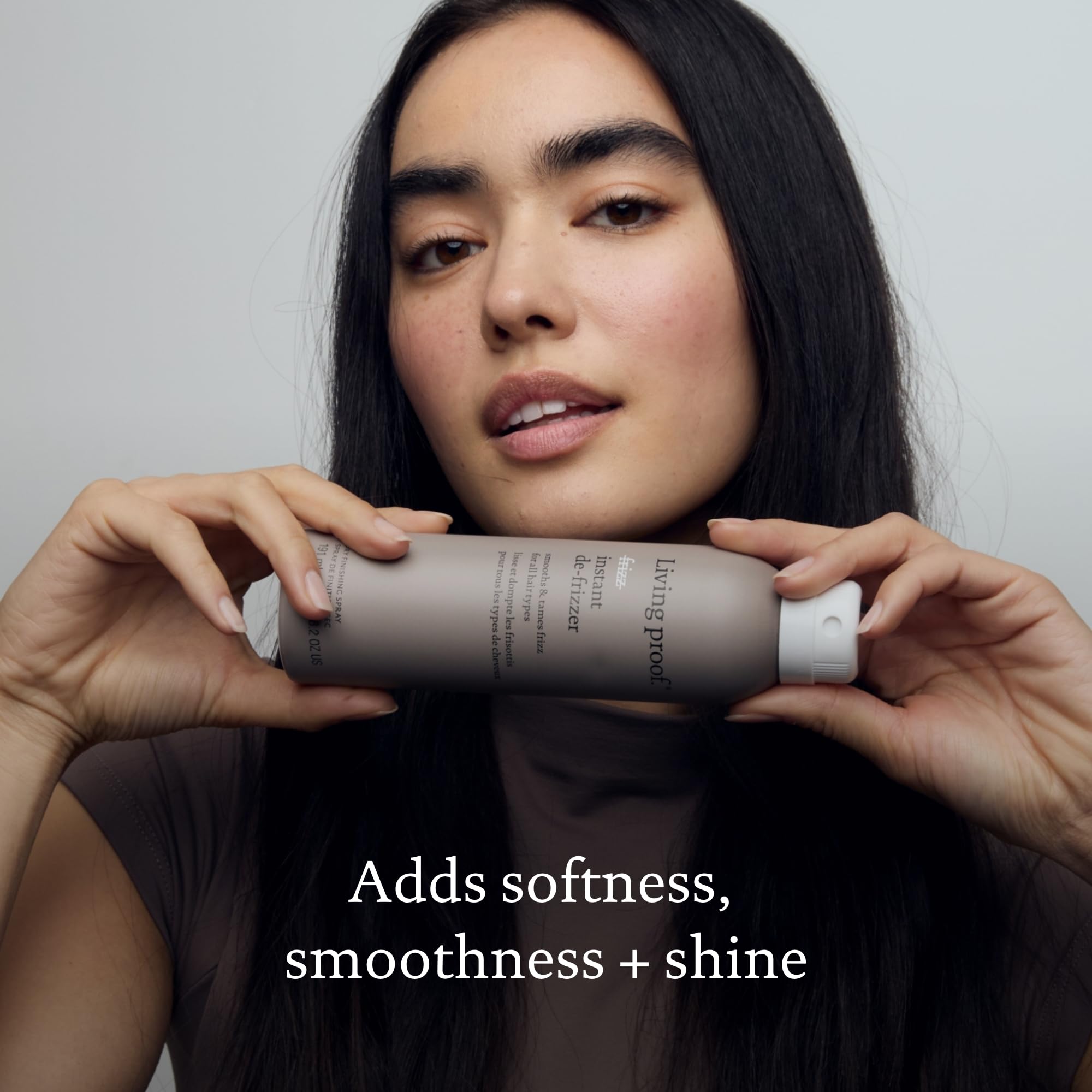 Living Proof No Frizz Instant De-Frizzer closeup shows smooth, glossy hair