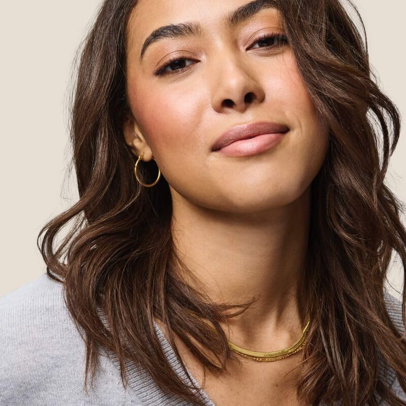 Living Proof No Frizz Instant De-Frizzer softens hair between washes