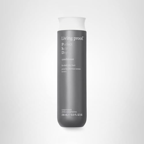 Living Proof Perfect Hair Day Conditioner close-up shows hair softness and shine.