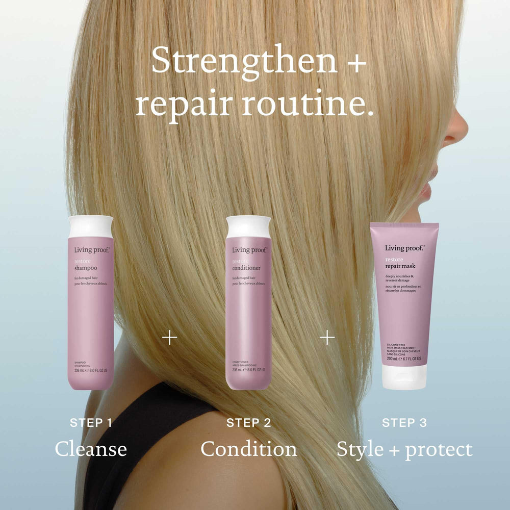 Living Proof Restore Shampoo compact bottle in a gym bag ready for travel.