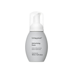 Living Proof Full Texturizing Foam bottle delivering airy texture and lasting volume.