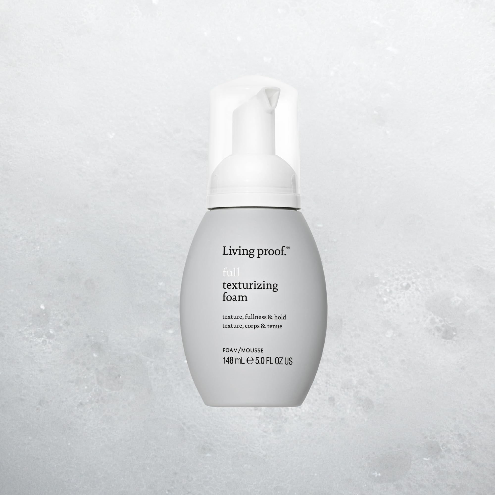 Close-up of the foam texture illustrating a lightweight styling product.