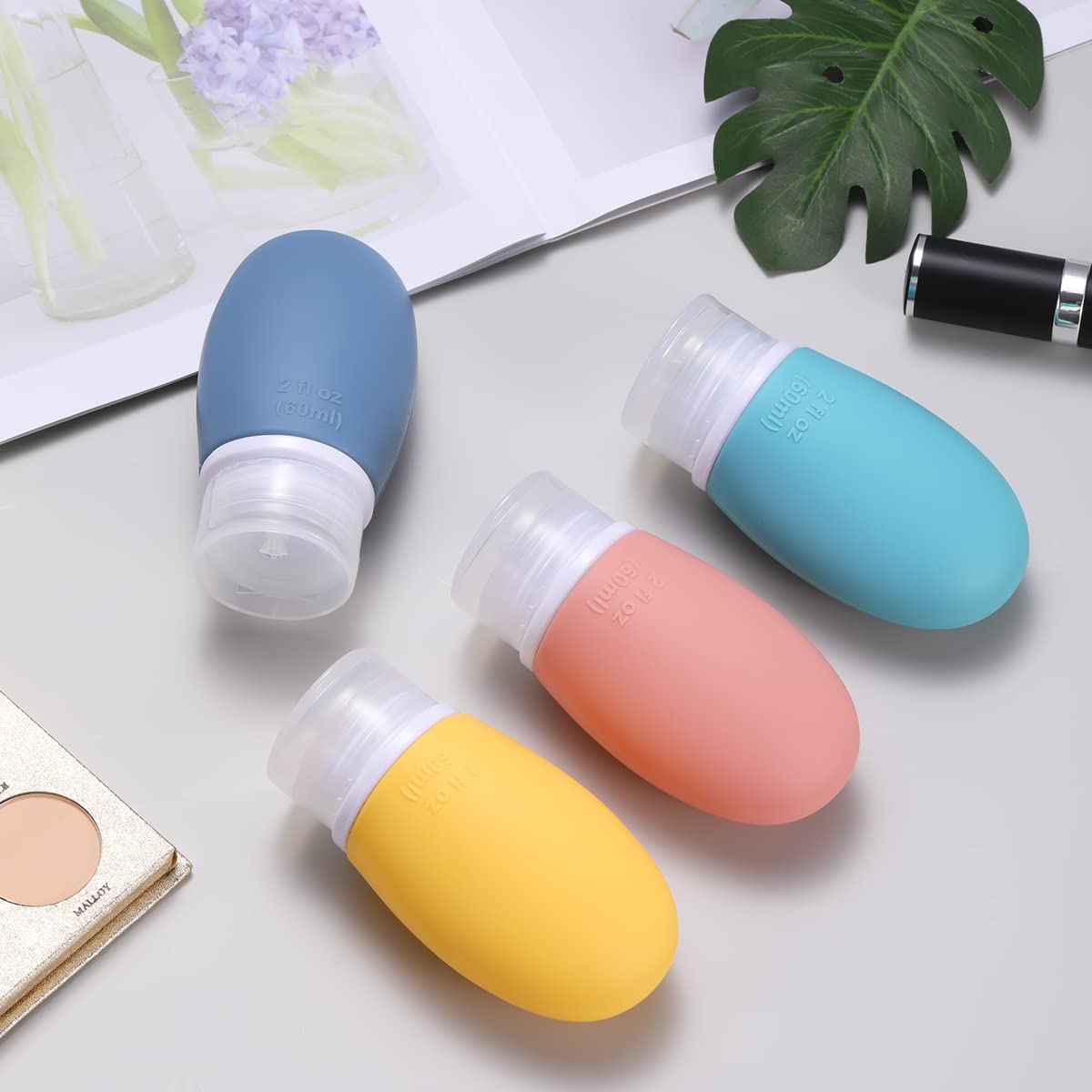 LIYUABU soft-flexible-body travel bottles close-up emphasizing drop resistance and reuse