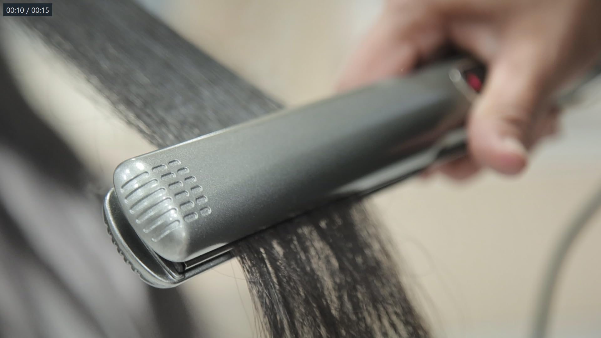 Lizze Extreme used on dry frizzy hair for a sleek finish.