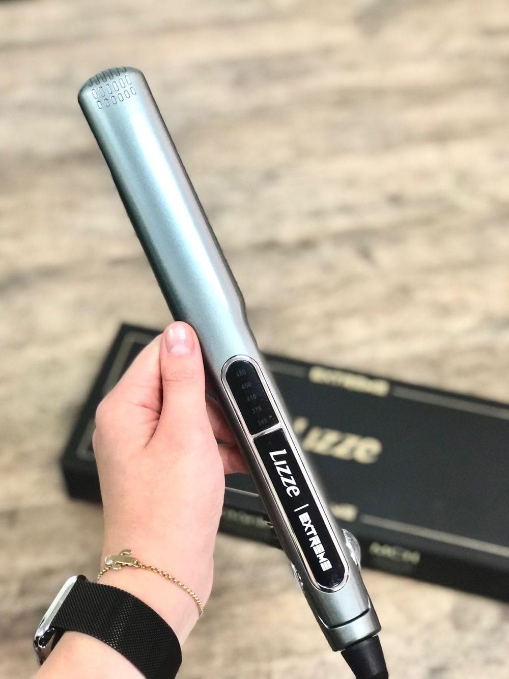 Lizze Extreme salon-grade straightener for professional results at home.