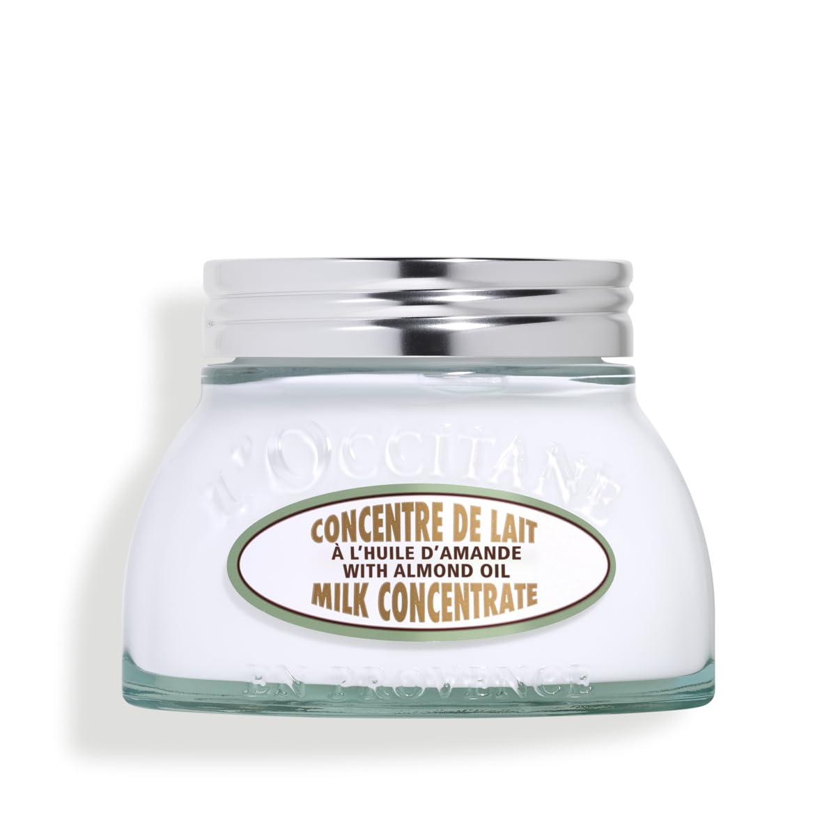L'Occitane Almond Milk Concentrate bottle demonstrating hydrated, velvety skin feel.