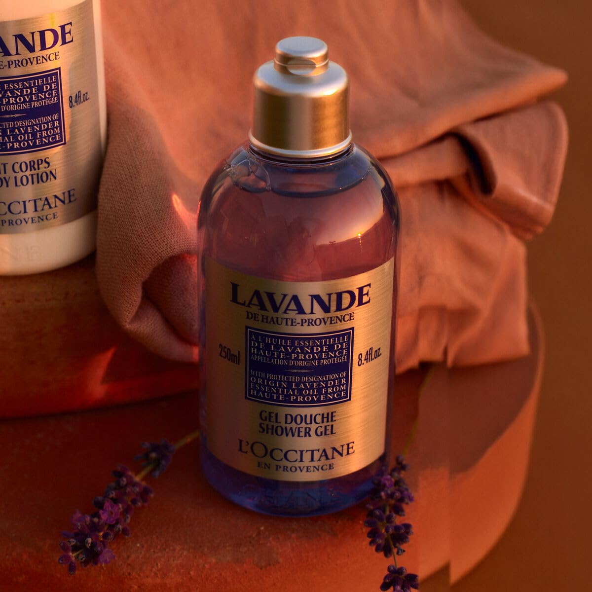 L'OCCITANE lavender shower gel bottle close-up showing lavender essential oil infusion.