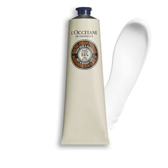 L'Occitane balm applied to dry heels for soothing relief.