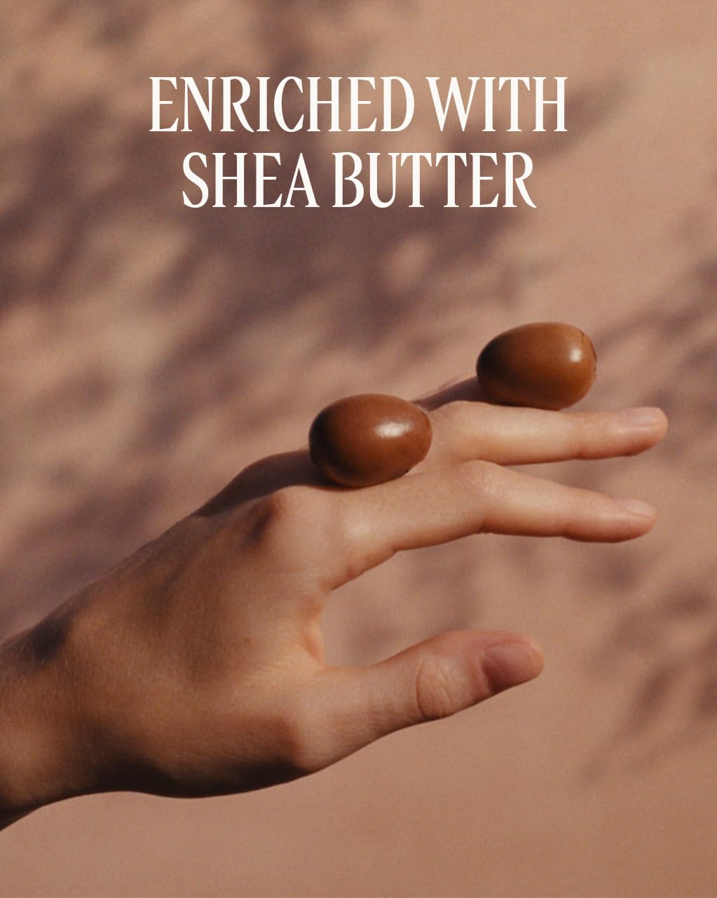 L'Occitane Shea Milk Soap bar held in hand shows travel-friendly size