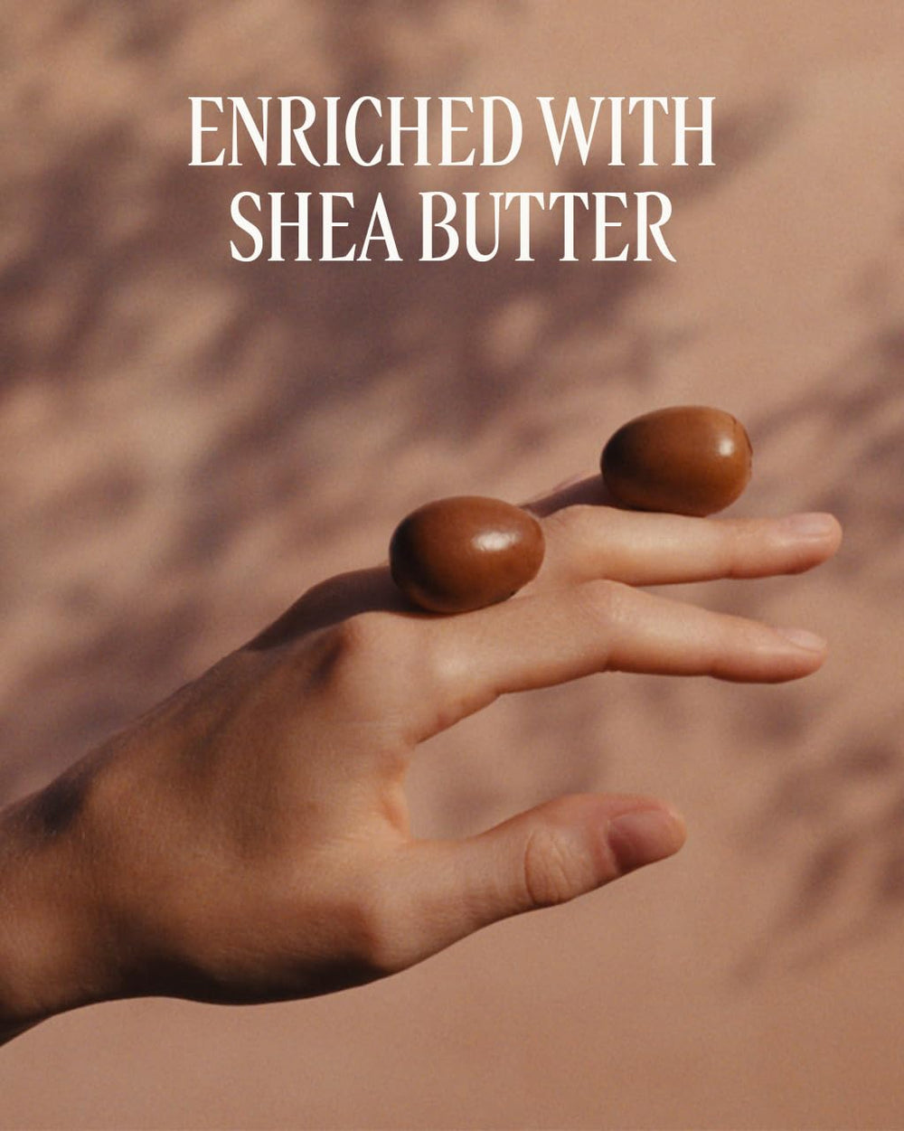 L'Occitane Shea Milk Soap bar held in hand shows travel-friendly size