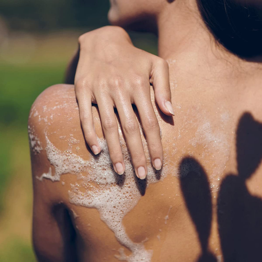L'Occitane Verbena Shower Gel bottle in morning light, inviting refreshing ritual.