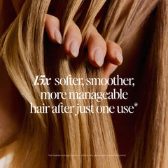 LolaVie Glossing Detangler spray on application for even distribution on wet hair