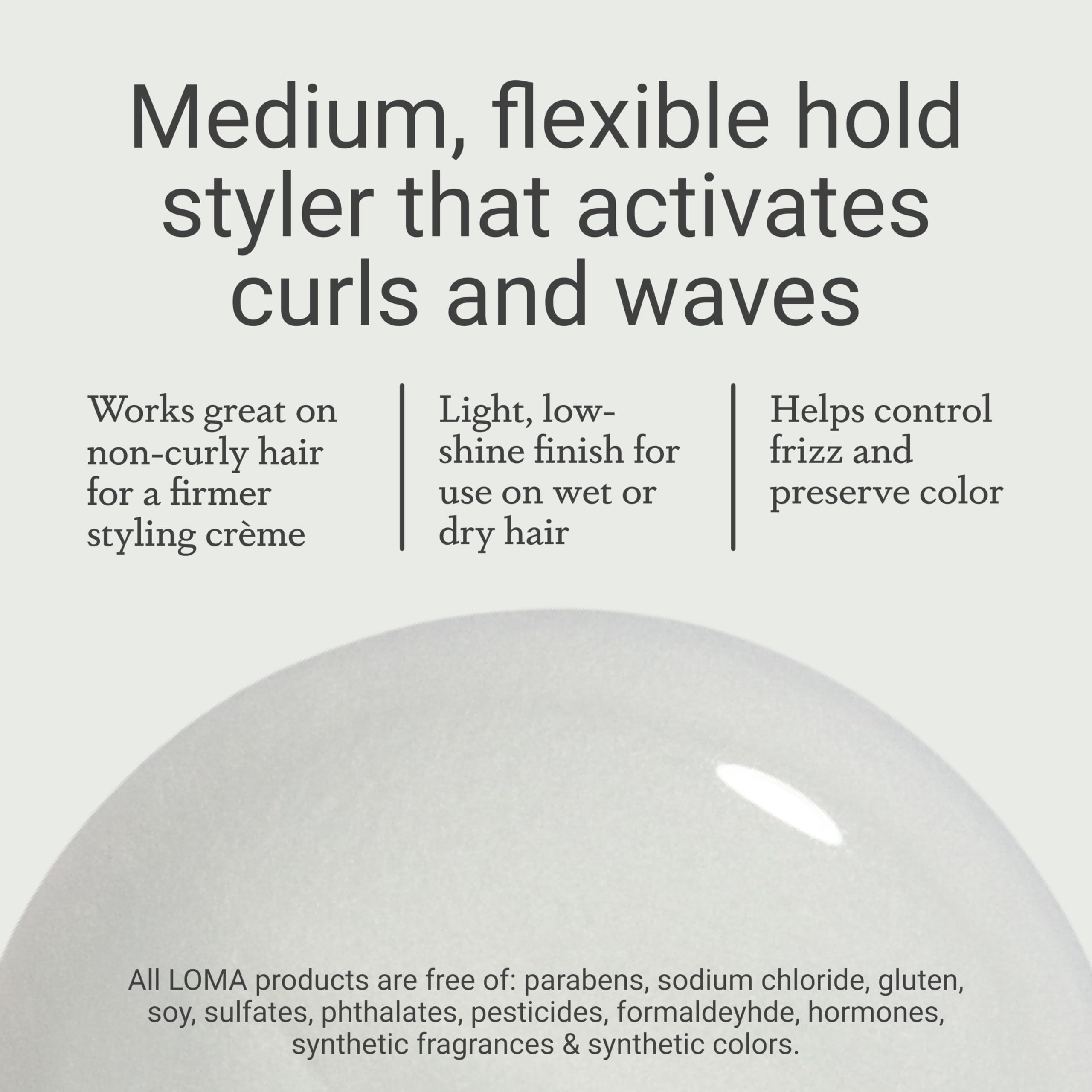 Applying Curvy Crème on hair demonstrates medium hold for curls