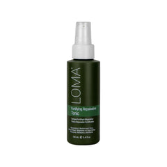 Loma Fortifying Reparative Tonic bottle highlighting color protection for vibrant hair.