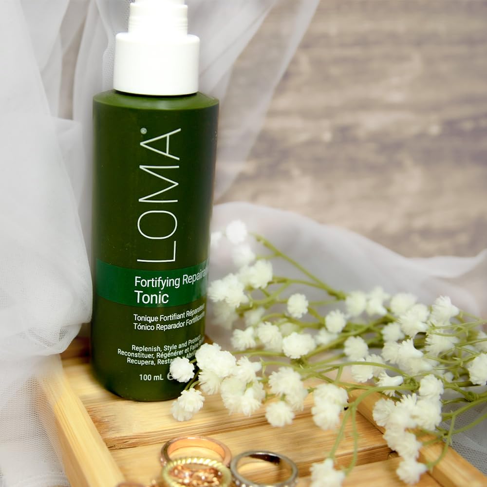 Loma Fortifying Reparative Tonic dispensing action shows even distribution and finish.