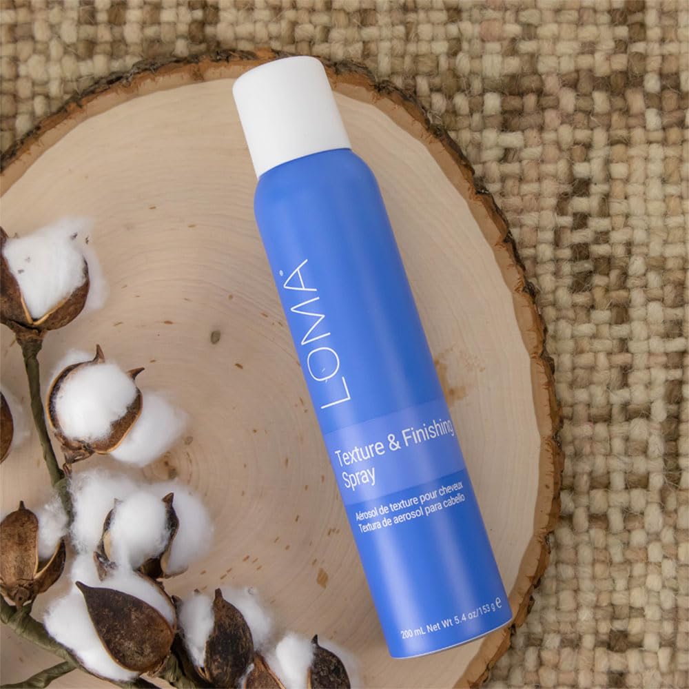 Loma Aroma blend of orange, tangerine and cranberry pear enhances scent during styling.