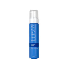 LOMA Volumizing Foam bottle demonstrates lightweight volume for fine hair.