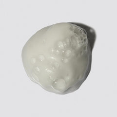 LOMA Volumizing Foam texture close-up reveals airy body and shine.