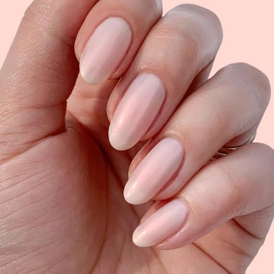 LONDONTOWN Illuminating Nail Concealer brush applies evenly on natural nails.