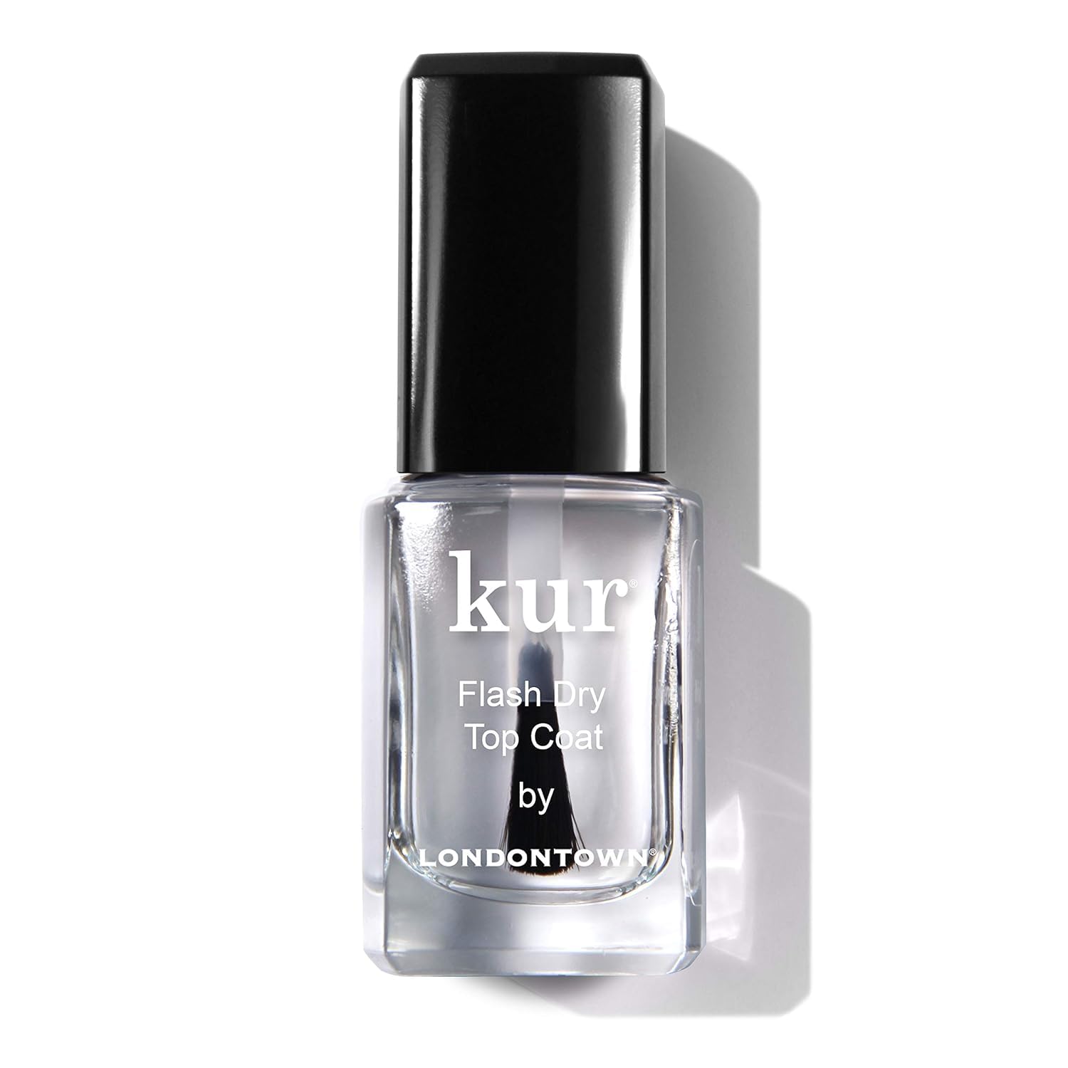 LONDONTOWN kur Flash Dry Top Coat facilita la aplicación rápida para manicura en movimiento.