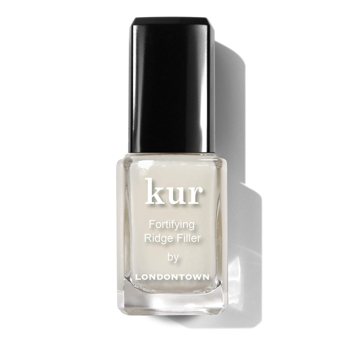 LONDONTOWN Kur Nail Ridge Filler bottle close-up for a smoother base