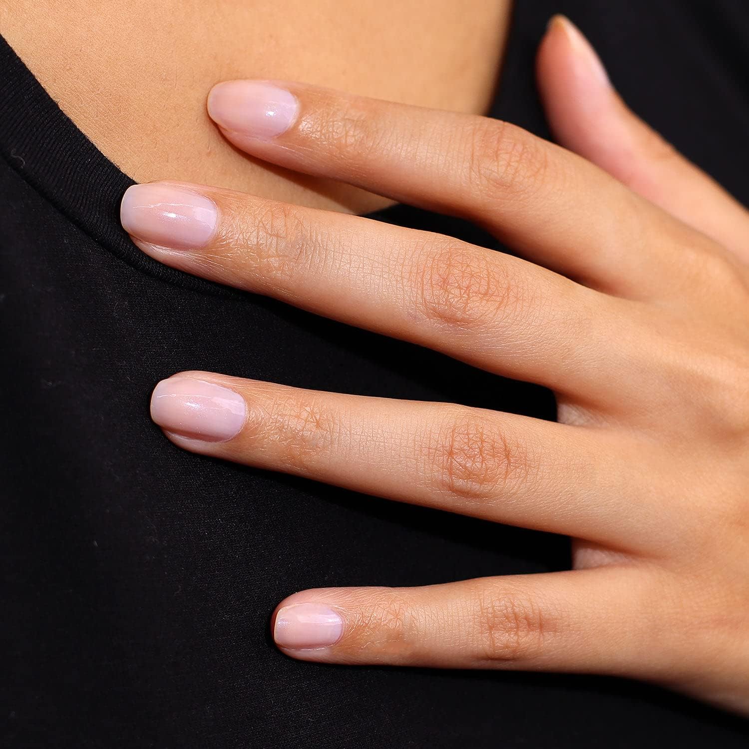 LONDONTOWN kur Gel Genius Top Coat shows a glossy durable seal after application.