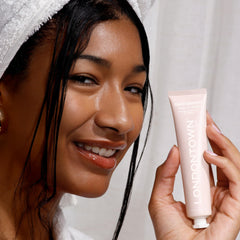 Creamy texture close-up emphasizes gentle cleansing and brightening on nails.