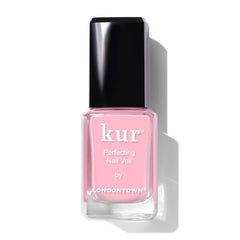 LONDONTOWN Perfecting Nail Veil en botella rosada para un look suave y natural.