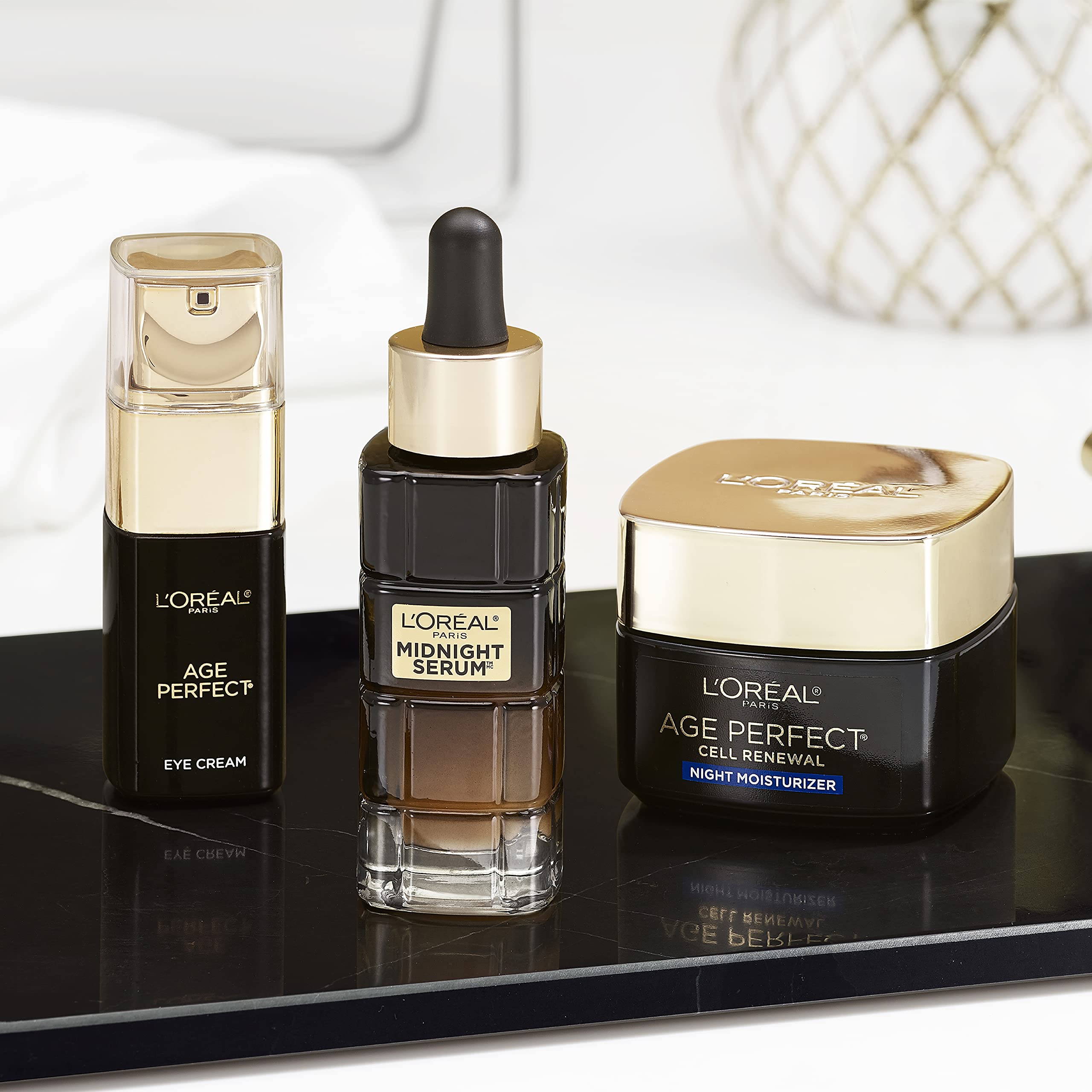 Applying L'Oreal Paris Age Perfect Night Moisturizer as part of routine