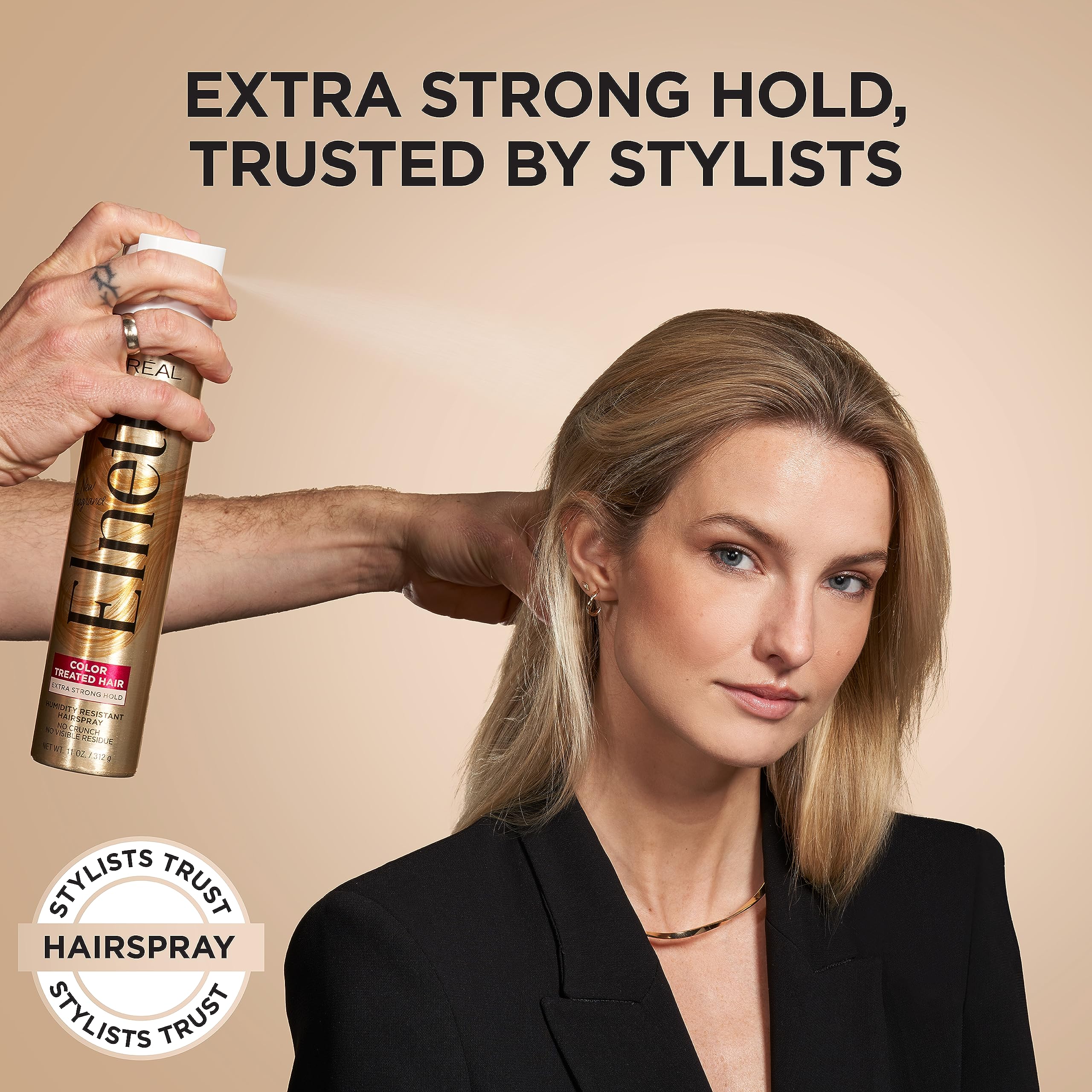 L'Oreal Paris Elnett Satin resists humidity to keep styles in place.