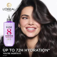 Elvive Hydration Shampoo, Conditioner, and Replumping Serum arranged for a hydration routine