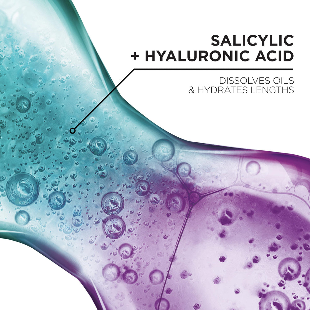 Close-up of oil erasing serum application on scalp for prep cleansing