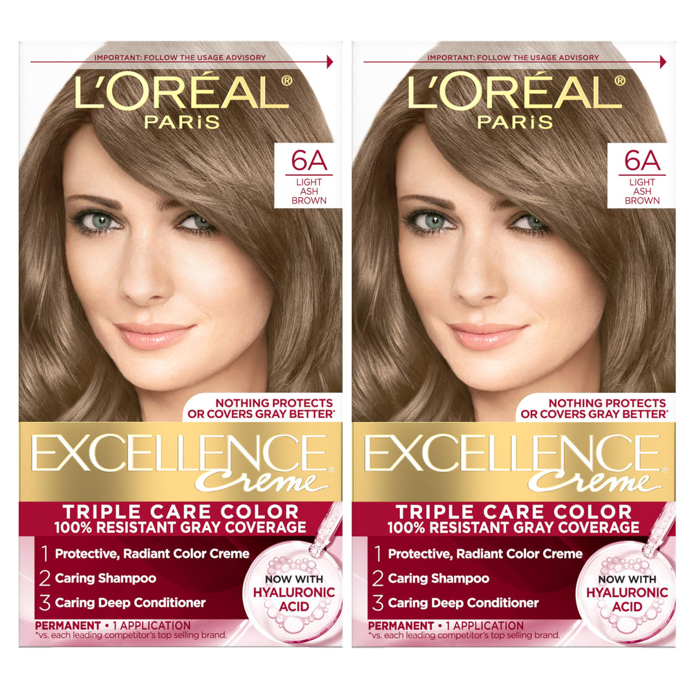 L'Oreal Paris Excellence Creme color cream applied to hair for gray coverage.